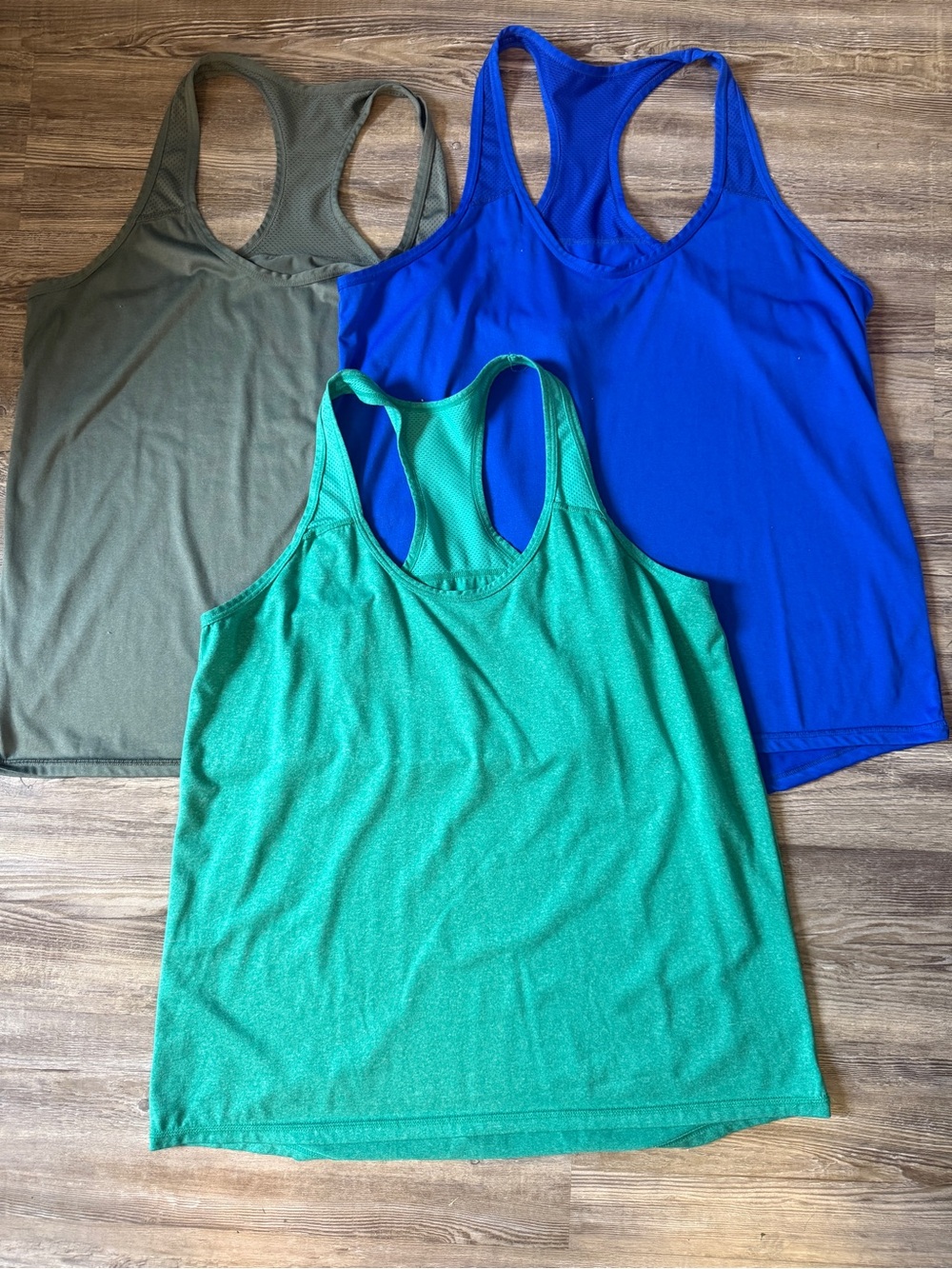 Xersion Racerback Tank Trio in Olive, Royal Blue & Teal